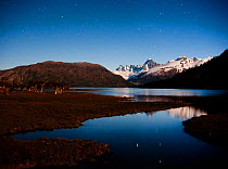 Cerro Azul, Krueger Peak, Cerro Mellizo, in starlight reflections in Rio Pasqu flowing from Lago O'Higgins, Aisen Province, Chile