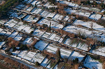Aerial view of small allotment gardens with a light covering of snow, near Salin de Giraud village, Camargue, Southern France, January 2009