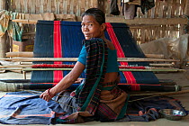 Woman of Chakma tribe at loom. Tripura, India, March 2012.