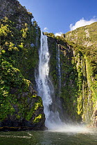 Stirling Falls dropping 146m into the sea, Milford Sound, Fiordland, South Island, New Zealand