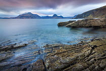 View of the Cuillin Hills across Loch Scavaig from Elgol Beach. Isle of Skye, Inner Hebrides, Scotland, UK, March 2012.