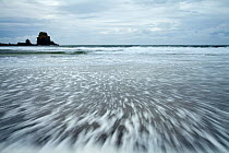 Receding sea wave pattern on beach. Talisker Bay, Isle of Skye, Scotland, UK, October 2011.