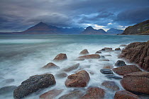 Rocky coastline near Elgol with view to Cuillins, Isle of Skye, Scotland, UK, October 2011.