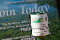 Donation pot on Flora of the Fells conservation day. Helvellyn, Lake District National Park, Cumbria, September.