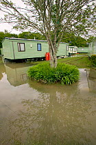 Flooded caravan site in Dol y bont after River Leri from 5 inches of rain in 2 days 10th June 2012, Ceredigion, Wales, UK