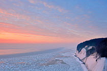 Dawn over frozen Baltic Sea in winter,  Ernst-Moritz-Arndt-View, Jasmund National Park, Germany, February 2011