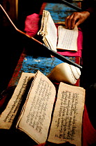 Manuscripts at Buddhist Ceremony at the Ligaon Buddhist monastery (2.910m). Manaslu Conservation Area, Himalayas, Nepal, October 2009.