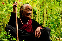 Old woman in the Budhi Gandaki river valley. Manaslu Conservation Area, Himalayas, Nepal, October 2009.