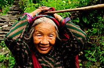Old woman in the Budhi Gandaki river valley. Manaslu Conservation Area, Himalayas, Nepal, October 2009.