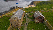 Timelapse of tourists arriving on the Farne Islands by boat, Northumberland, England, UK, July 2011