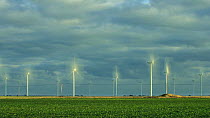 Timelapse of wind turbines rotating, with clouds moving overhead, Little Cheyne Court Wind Farm, Romney Marsh, Kent, England, UK, January 2012