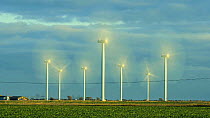 Timelapse of wind turbines rotating, with clouds moving overhead, Little Cheyne Court Wind Farm, Romney Marsh, Kent, England, UK, January 2012