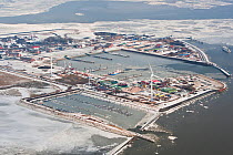 Aerial view of frozen harbour of Borkum in winter with ice sheets and snow, East Frisia, North Sea, Lower Saxony, Germany February 2012
