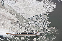 Aerial view of frozen harbour of Langeoog in winter with ice sheets and snow, East Frisia, North Sea, Lower Saxony, Germany February 2012