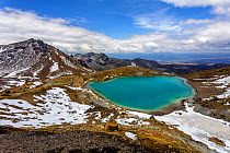 The upper Emerald Lake on the Tongariro Crossing, looking east, it striking colours are caused by dissolved minerals being washed down from thermal area of nearby Red Crater, Tongariro Crossing, Tonga...