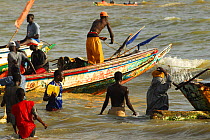 Fishermen off the beach in Mbour, in the 'Petite Cote', south of Dakar, Senegal, September 2006. September 2006.