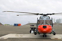 Royal Navy helicopter (mounted with Gyron) parked at Rothera, British Antarctic Survey base. Antarctic Peninsula. February 2008. Taken on location for BBC tv series 'Life'