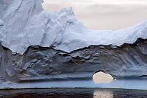 Window in iceberg in soft light. Antarctic Peninsula. February 2008.