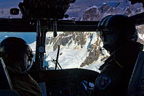 Interior of Royal Navy helicopter showing pilots. Antarctic Peninsula. February 2008. Taken on location for BBC tv series 'Life'