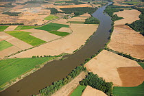 RF- Aerial image of farmland bordering river, Salamanca Region, Castilla y Leon, Spain, May 2011. (This image may be licensed either as rights managed or royalty free.)