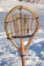 A traditional Selkup shovel for removing pieces of ice from the water while checking fishing nets in a frozen river, Krasnoselkup, Yamal, Western Siberia, Russia 2012