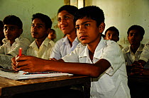 School boys in a classroom, Dhaka. Bangladesh, June 2012.