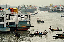 A mixture of working boats on the Sadarghat water front, Dhaka, Bangladesh, June 2012.