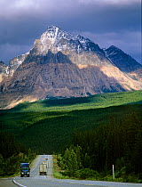 Trucks on Yellowhead Highway below Mount Fitzwilliam, Mount Robson Provincial Park, Rocky Mountains, British Columbia, Canada