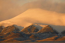 Yuxu mountain covered in snow, Kekexili, Qinghai, China, December 2006