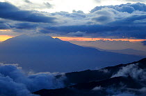 Dusk on Mount Kilimanjaro with Mount Meru in background (4566m), both dormant volcanos, Tanzania