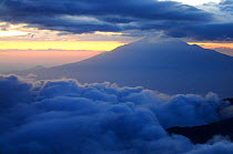 Dusk and clouds on Mount Kilimanjaro with Mount Meru in background (4566m), both volcanos, Tanzania