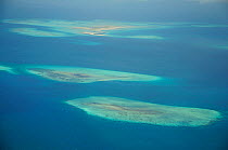 Aerial view of sand atolls and corals off the coast of the Island of Zanzibar, Tanzania