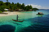 Fishing in shallow island waters at Yenbeser Village, Raja Ampat, Indonesia 2009