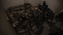 THIS VIDEO CLIP WILL BE AVAILABLE TO VIEW ONLINE SOON. TO VIEW NOW, PLEASE CONTACT US. - Confiscated ammunition and African elephant (Loxodonta africana) ivory in storeroom, Zakouma National Park, Cha...