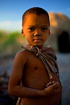 Portrait of a child in a Zu/'hoasi Bushman community in the Kalahari, Botswana. April 2012. No release available