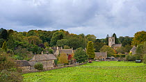 View of the village Naunton, showing the village church of St. Andrew's, Cotswolds, Gloucestershire, UK, October 2012