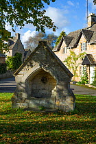 Horse drinking trough at Upper Slaughter, Cotswold village, Gloucestershire, England, September 2012