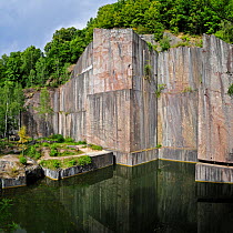 Water in the abandoned red marble quarry of Carriere de Beauchateau in the Belgian Ardennes, Belgium, August 2012