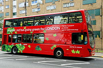 Double decker London bus powered by electric hybrid technology, London, UK August 2009