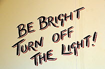 Be Bright Turn Off the Light, written on the lavatory wall at Hackney City Farm, London, England UK