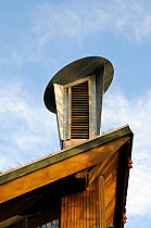A Cowl which incorporates a passive ventilation system on the roof of the Centre for the Environment, Horniman Museum, London, UK
