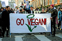 Go Vegan banner at the Climate Change March London, UK