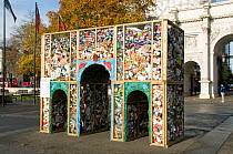 Marble Arch replica built from litter collected from nearby Oxford Street which will hopefully be recycled when the structure is dismantled, Central London UK November 2011