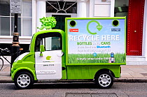 Mobile electric powered recycling vehicle in a Central London street, UK