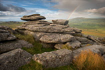 View of moorland from Great Staple Tor, with rainbow, Dartmoor National Park, Devon, England, UK, August 2012.