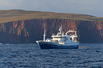 Fraserburgh pelagic trawler 'Chris Andra' fishing close to Eshaness, Shetland Isles, Scotland, UK, October 2012.