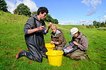 Conservation officer Joanne Backshall and volunteers David Greaves and Andy Banks from the Eden Rivers Trust gathering data from White clawed crayfish (Austropotamobius pallipes) as part of a capture...