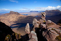 View from Sgorr Tuath towards Cul Beag, Cul Mor and Suilven, with sandstone pinnacles in the foreground, Coigach, Scotland, UK, March 2012.