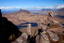 View from Sgorr Tuath towards Cul Beag, Cul Mor and Suilven, with sandstone pinnacles in the foreground, Coigach, Scotland, UK, March 2012. Did you know? Over 80% of all Marilyns (hills and mountains...