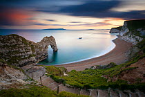 Durdle Door, Rock Arch and coastline on a stormy evening, Dorset, UK. May 2012.